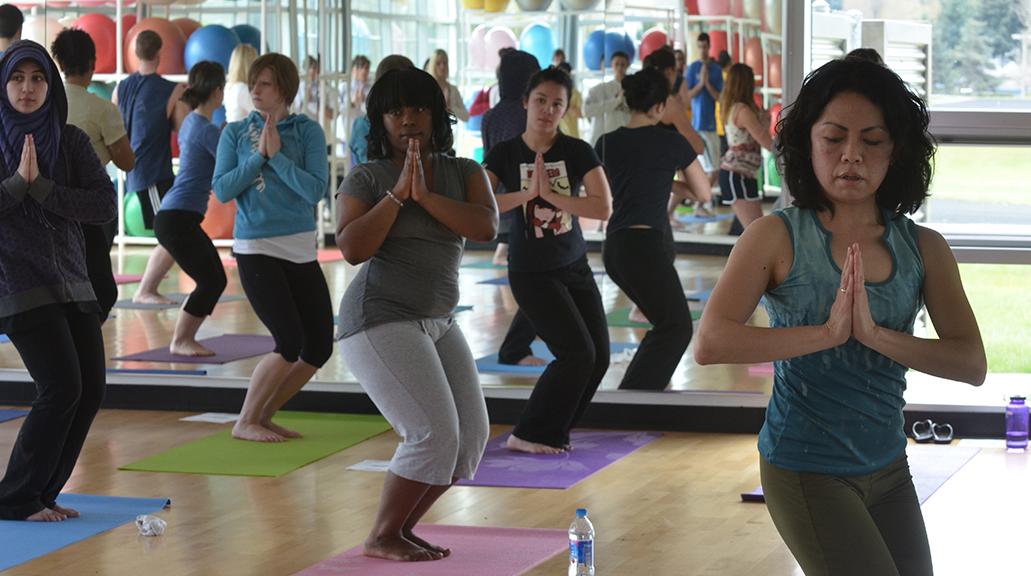 a yoga class in the aerobic gym